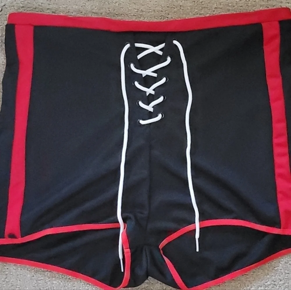 Dolls Kill 1/2 of Cheerleader Costume High Waist Lace Up Two Tone Mini Shorts - Picture 6 of 10